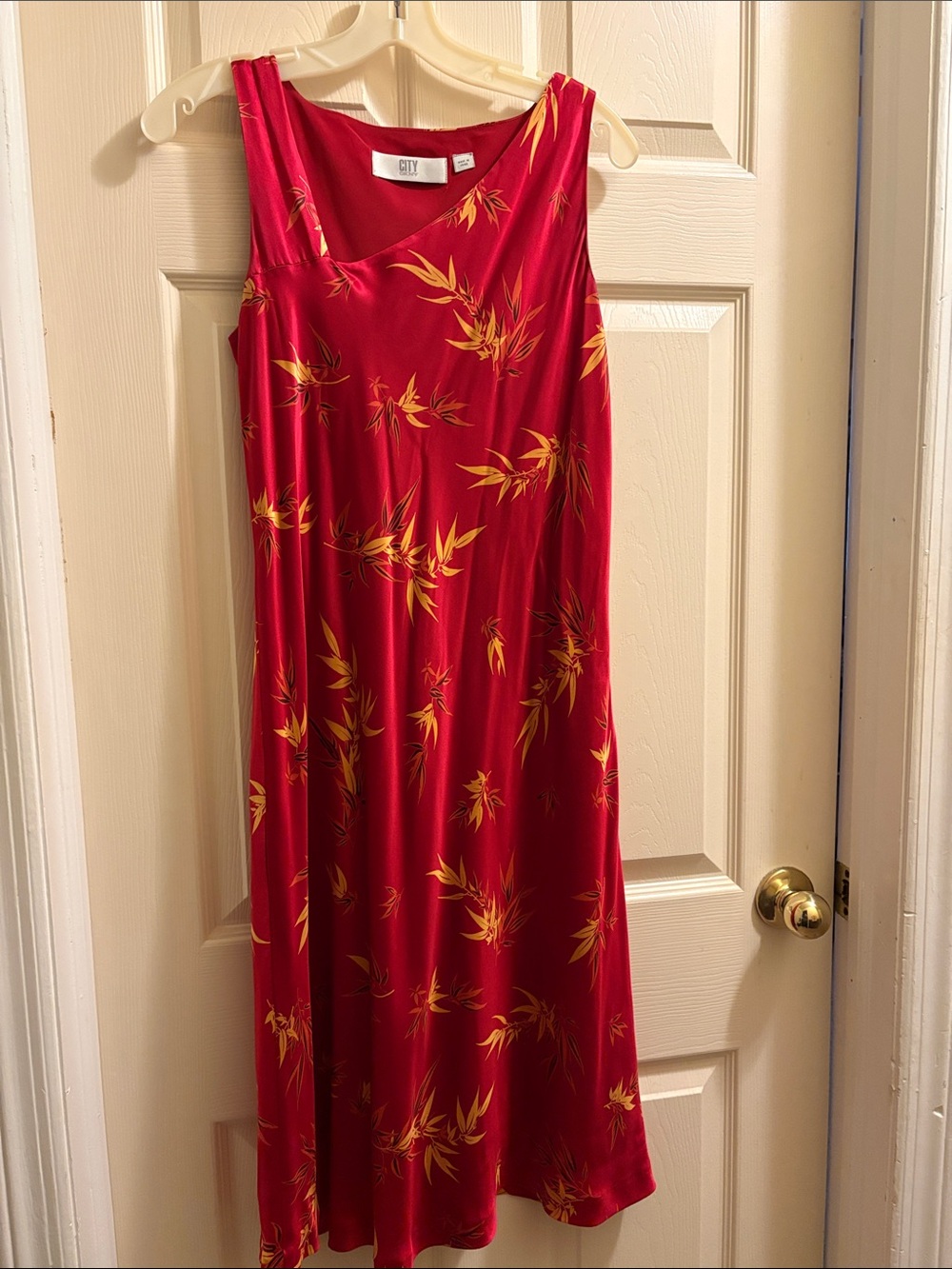Gorgeous red City DKNY dress with gold leaves size 12.  Worn once.